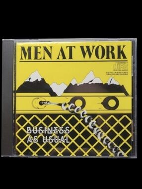 MUSIC CD       1982 "MEN AT WORK" BUSINESS AS USUAL